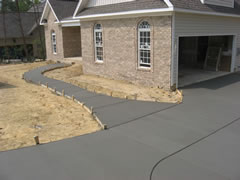Bobby's Concrete does new sidewalks and driveways